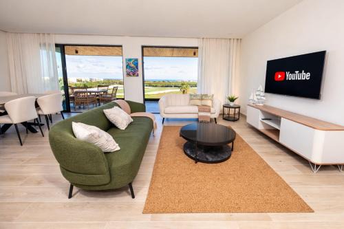 Resort-Style 2BR Golf & Ocean view at Cap Cana