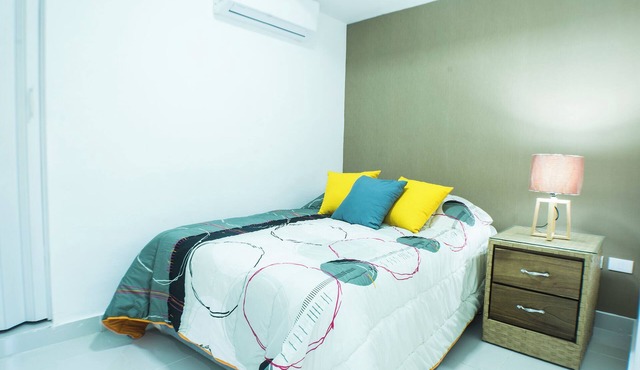 Serene 1-bedroom hotel with AC in vibrant Santo Domingo downtown