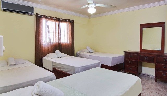 Spacious 2-Bedroom Apartment with Private Terrace Near SDQ Airport Fast Wi-F