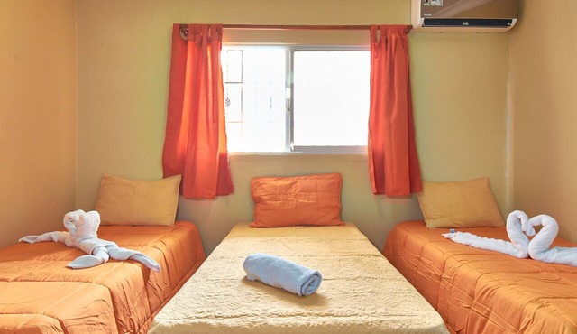 Spacious Apartment with 3 Single Beds Near SDQ Airport Free Wi-Fi & Parking