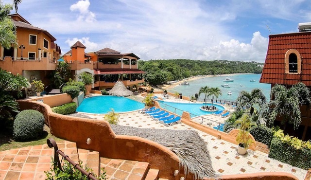 Top-floor hotel room with ensuite bathroom and sea views, central location