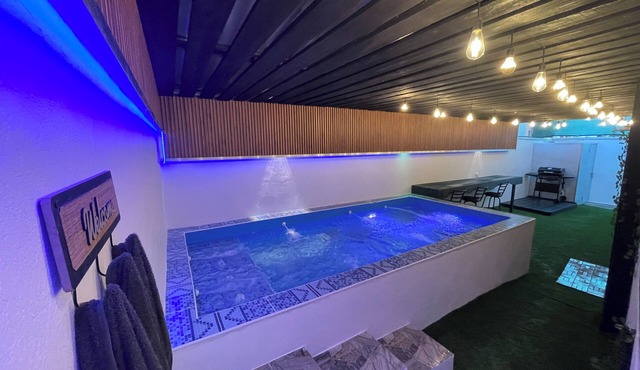 Tremendous 2-bedroom house with a private pool, office, and private parking.