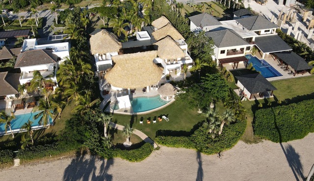 Tropical Golf View Villa. Steps to the ocean with a Gym and Theater-game room.
