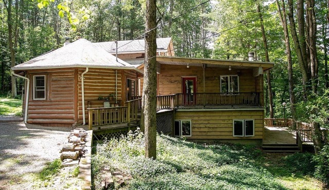 Unique forest vacation home on 70 acres of nature. A pond, creeks and more! in Spencer