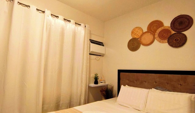 with balcony condo unit, near white beaches with pool, gym & breathtaking views