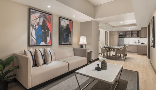 1 King Bed and 2 Single Beds, Two-Bedroom with Kitchen and Lounge Access