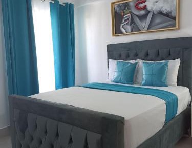 One-Bedroom Apartment with Balcony and City View