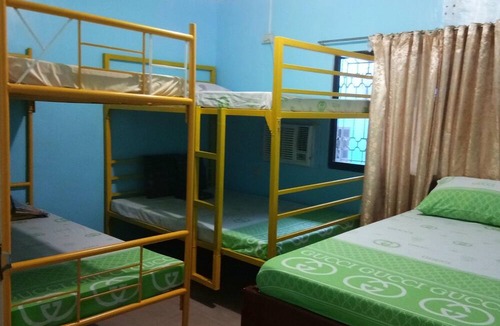 Olongapo House | Yellow HOUSE Vacation Rental