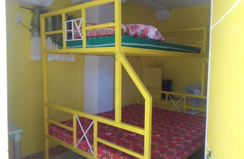 Olongapo House | Yellow HOUSE Vacation Rental
