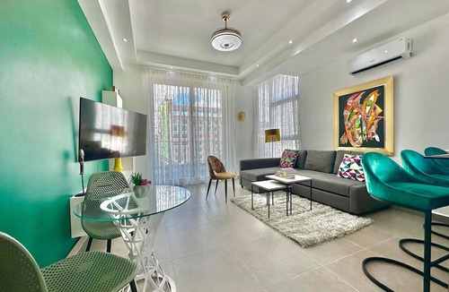 Yolanda Morales Condo | Stunning City Center Condo Full AC, Pool, Near All