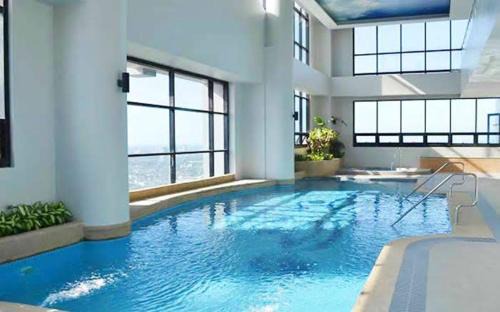 Wack-Wack Greenhills Apartment | Family Staycation with Pool