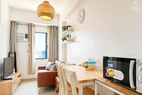 Cozy Japandi 2BR Condo Family Staycation with WIFI by Casa Luntian at The Leaf Residences