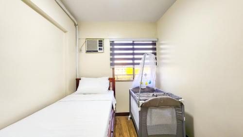 2BR Fully Air-Conditioned Staycation with Parking